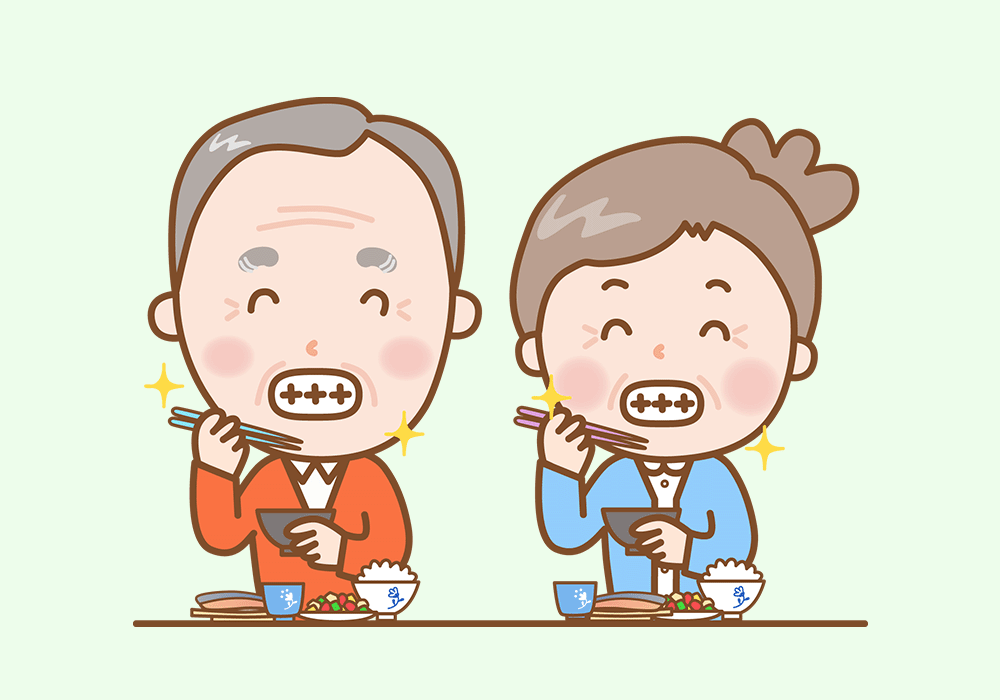 笑顔で食事する老夫婦