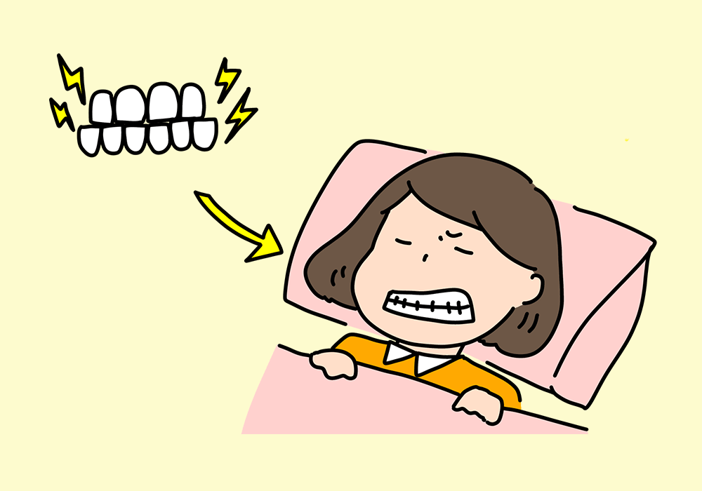 睡眠中歯ぎしりをする女性